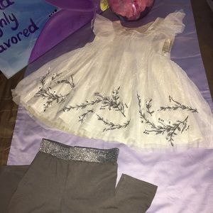 White and silver blouse With the gray leggings